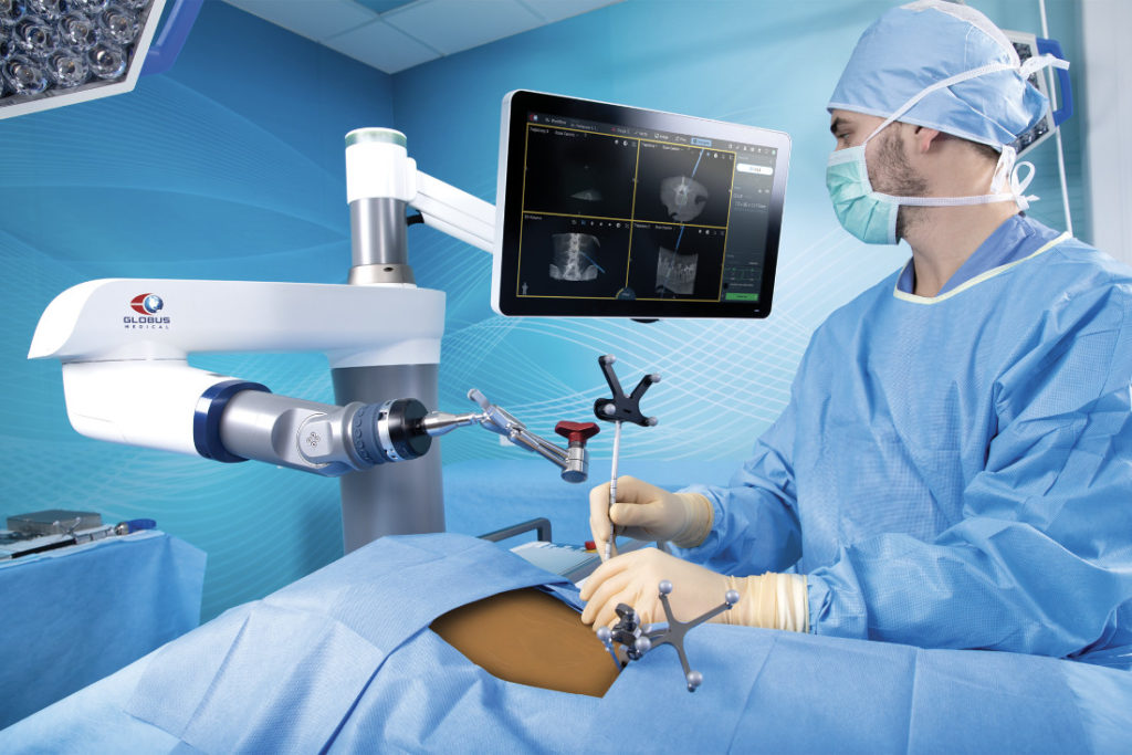 Surgeon looking at ExcelsiusGPS screen