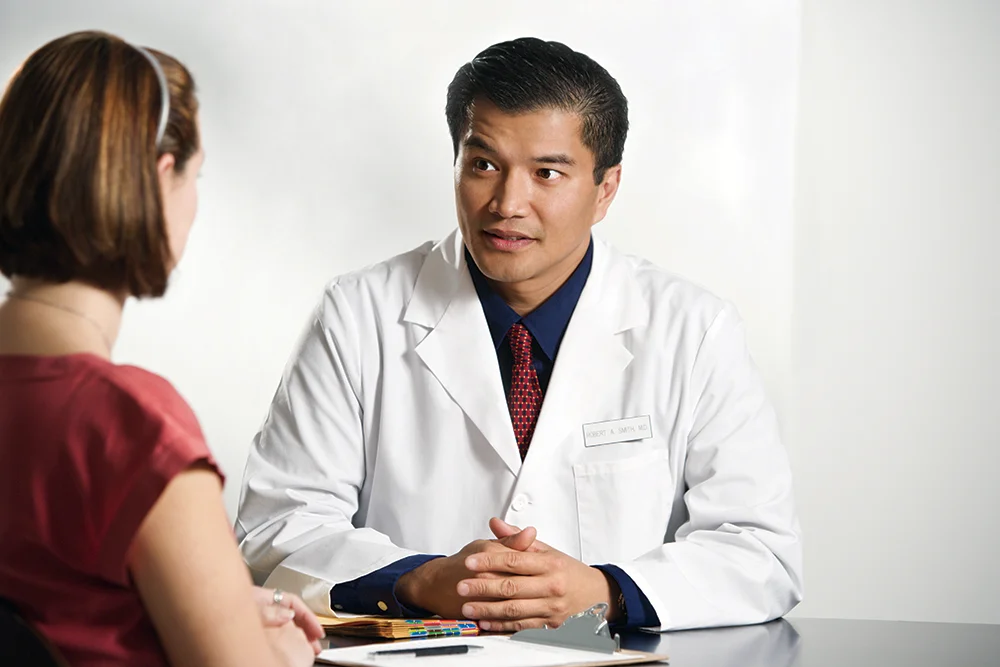 Doctor talking to patient