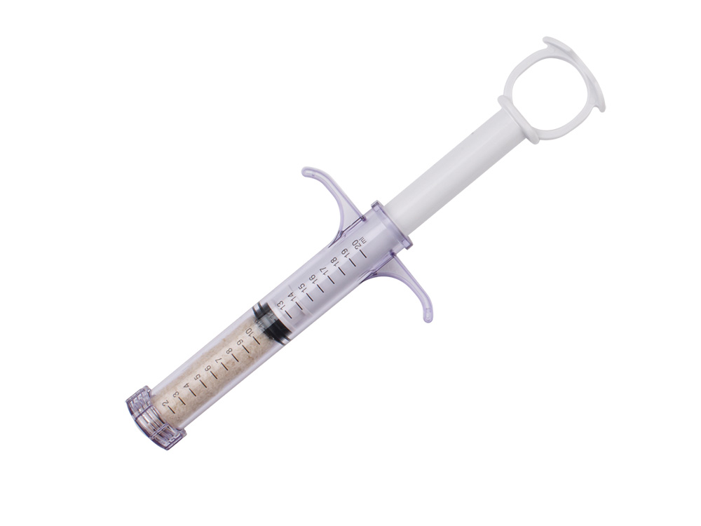 OSSIFUSE putty in syringe