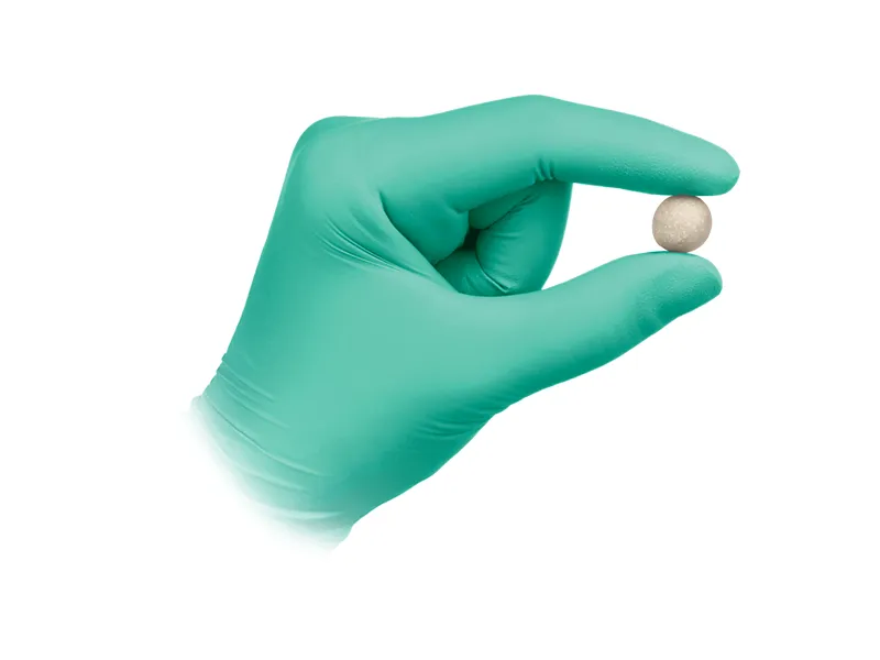 Gloved hand holding XEMPLIFI